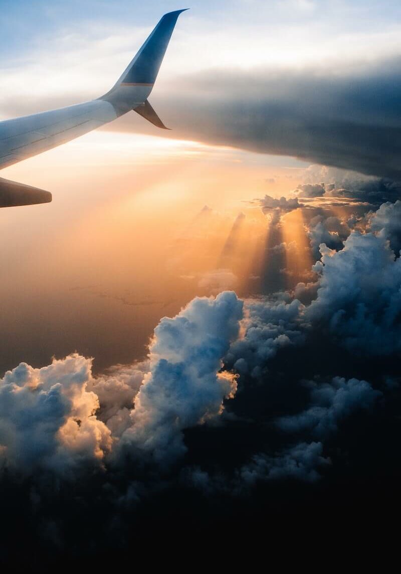 airplane on sky during golden hour